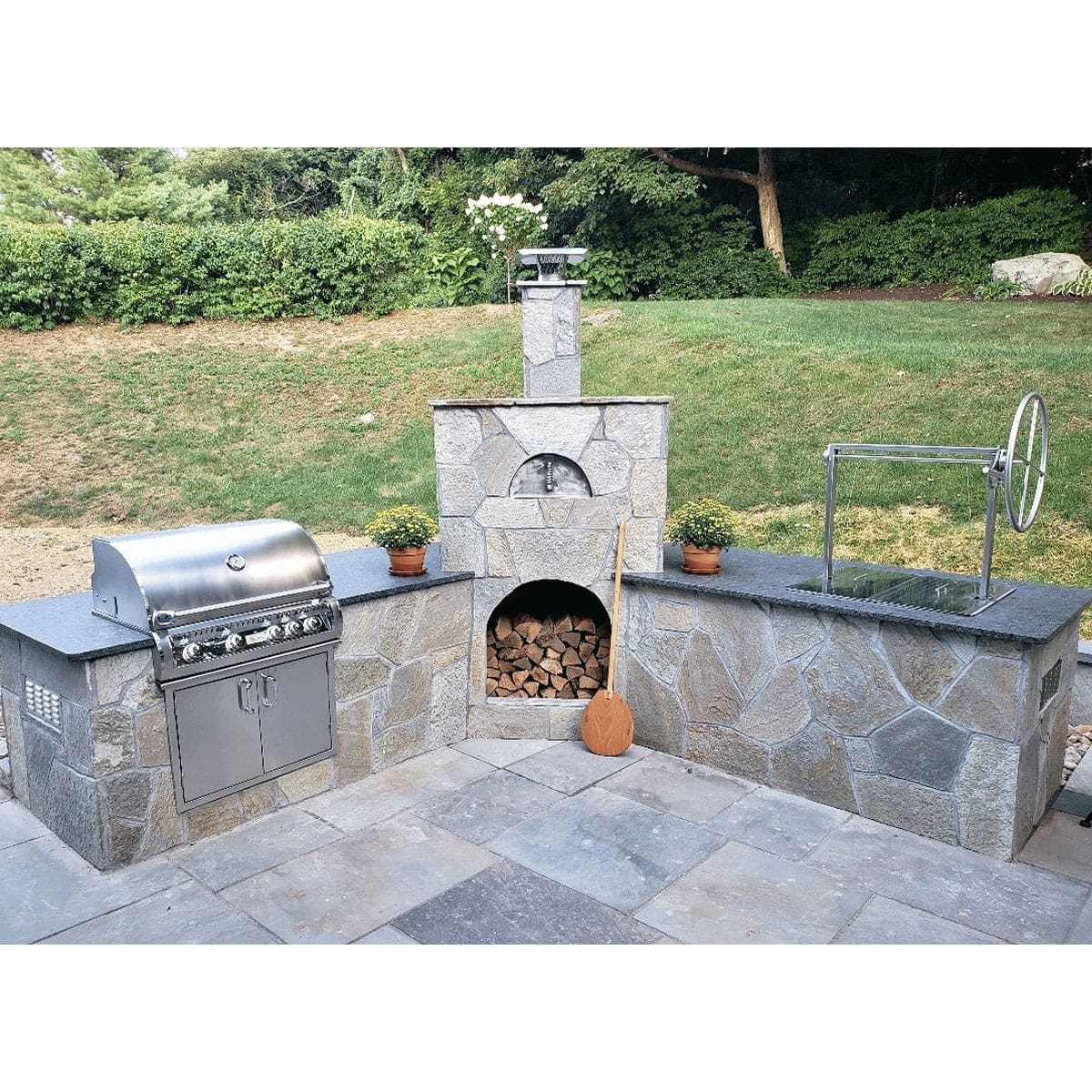 All stainless charcoal grill insert for an outdoor kitchen island.