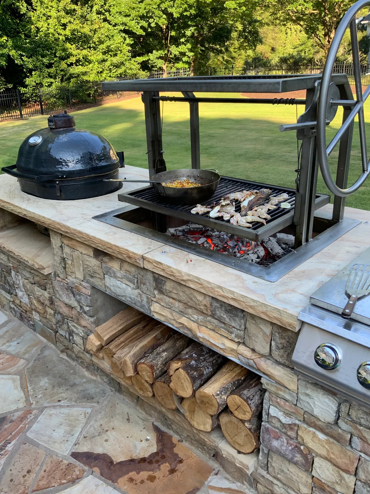Argentine Grill with Fire cooking shrimp. 