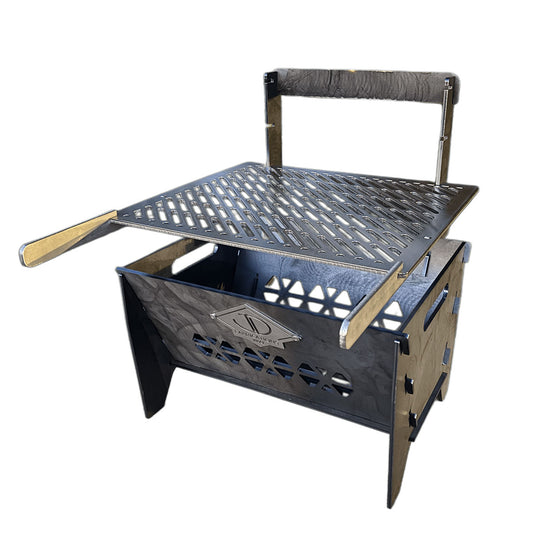 Portable height adjustable metal grill with stainless laser cut grate and removable metal handles on a white background