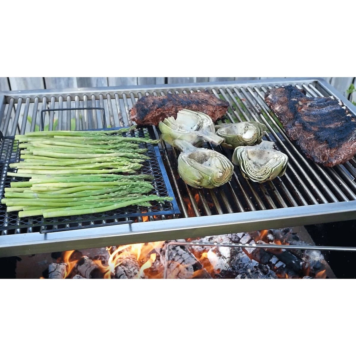 Gas log lighter for wood and charcoal burning grills