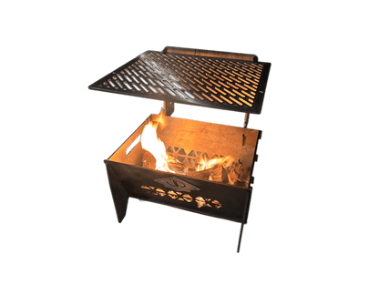 Portable grill with open lid showing flames on a green background