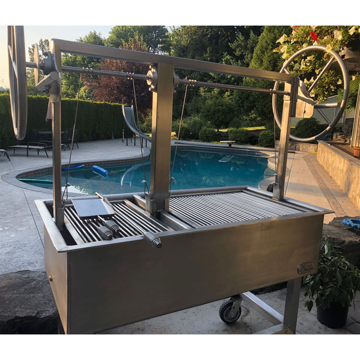 Santa Maria Stainless Steel Grill with Rotisserie in outside setting