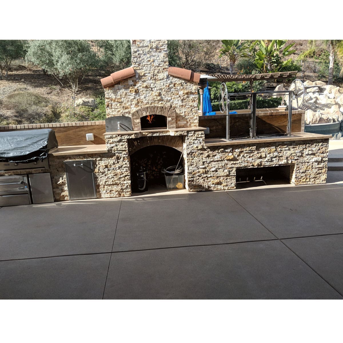 Built in Gaucho grill installed into an outdoor kitchen island