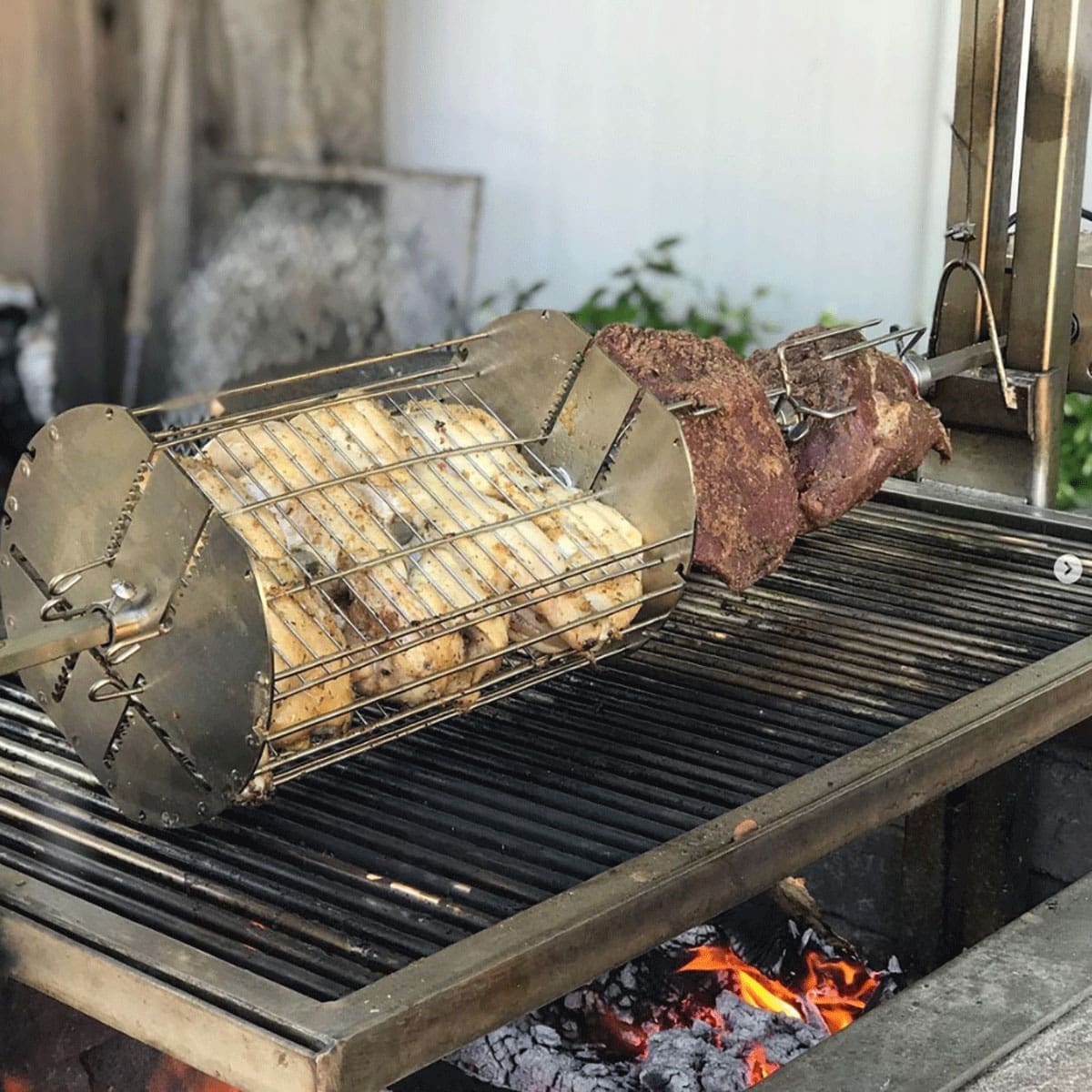 Rotisserie kit for a wood or charcoal grill.